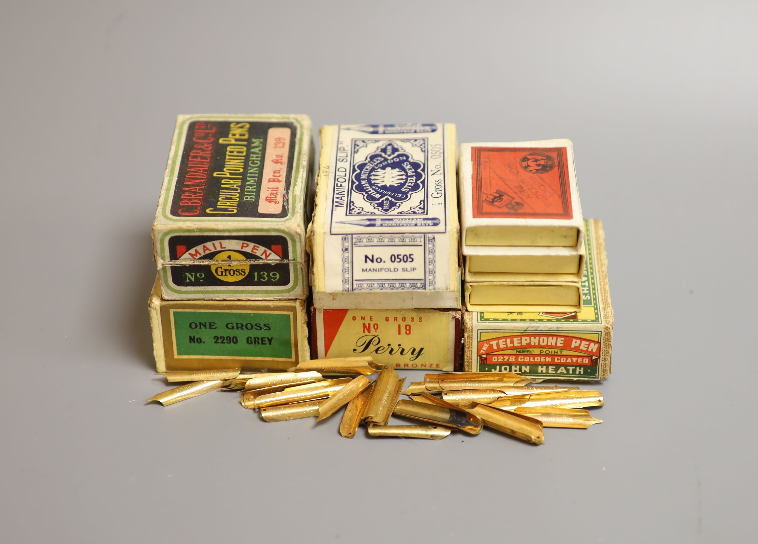 Early pen nib boxes with a larger quantity of dip pen nibs